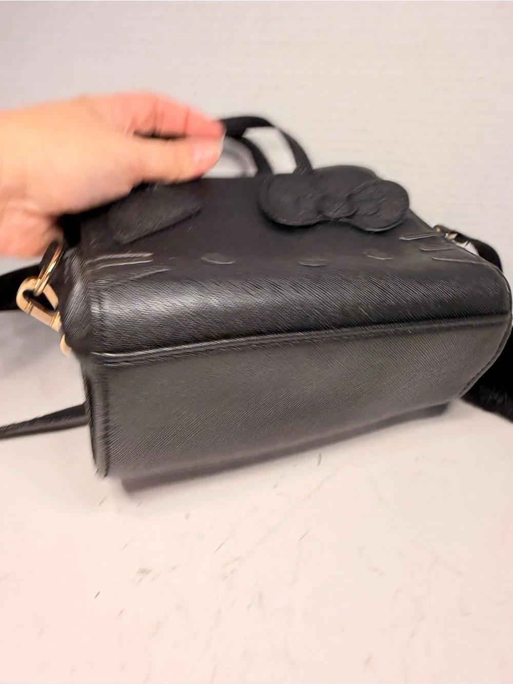Sanrio Hello Kitty Black Faux Leather Crossbody Handbag with Pom Pom Charm